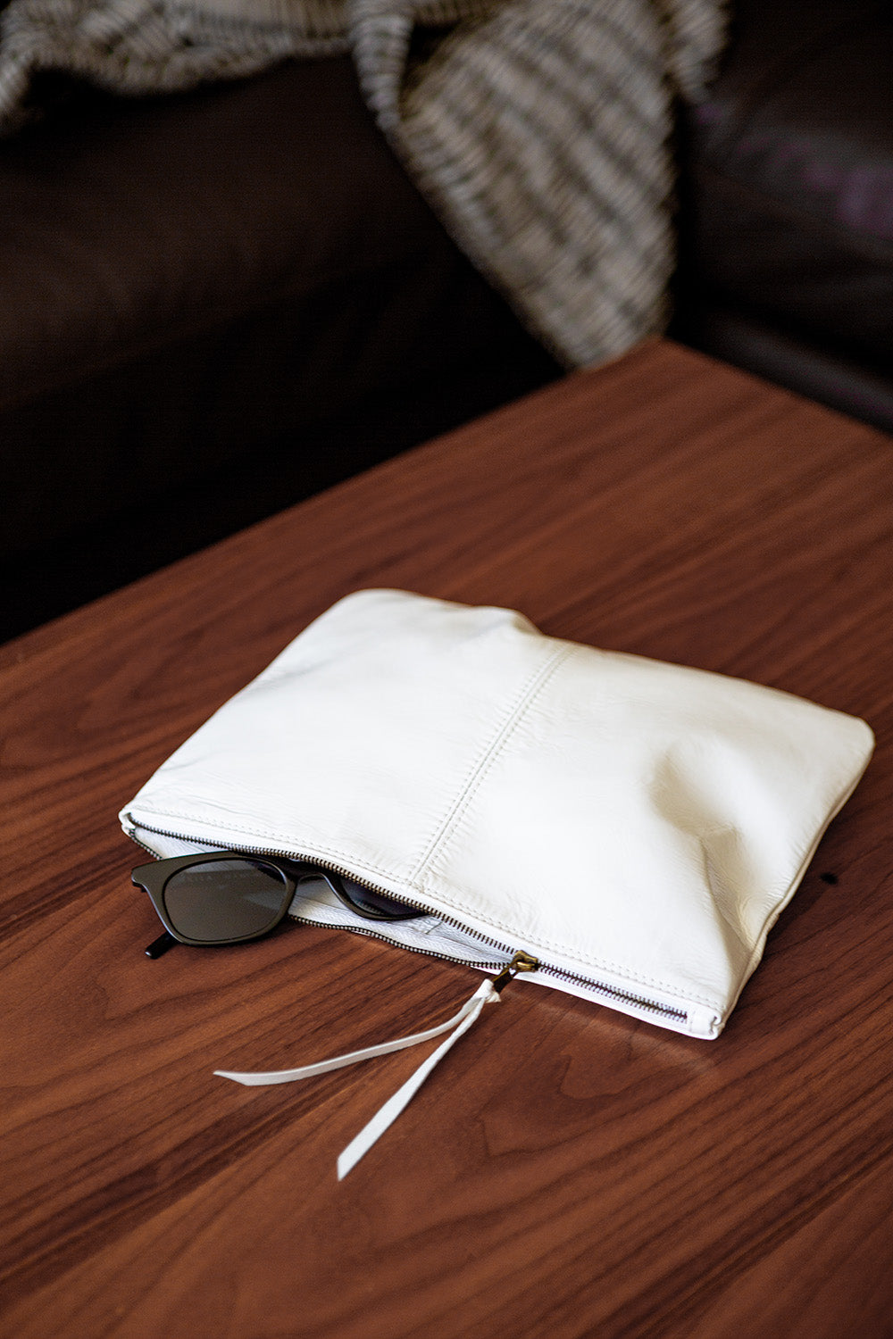 Elke Leather Zip Clutch In White Patent