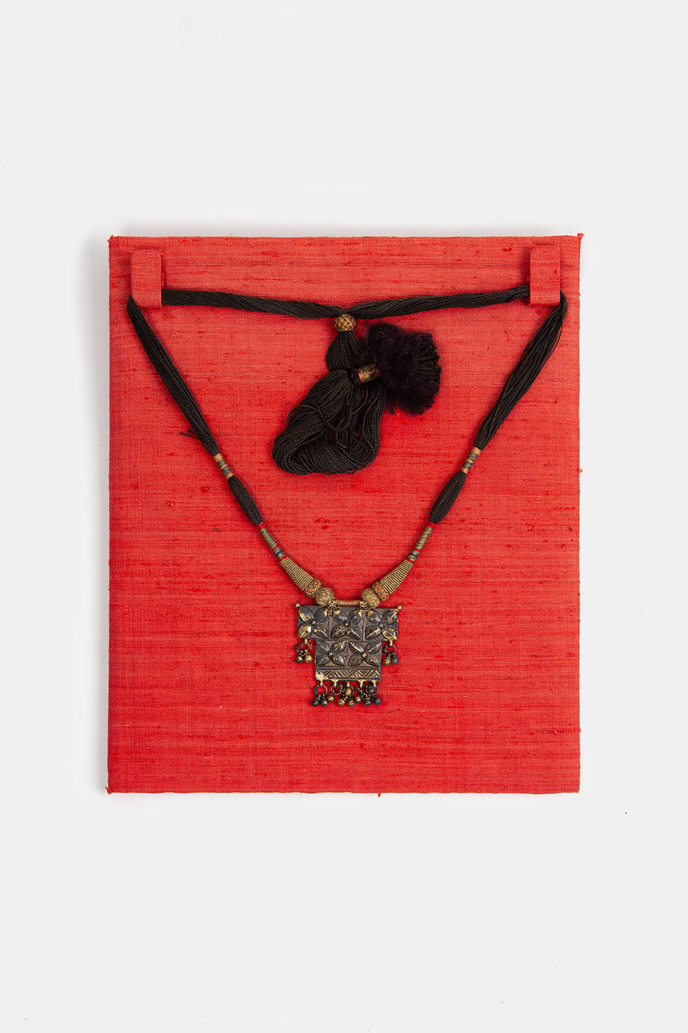 Silk thread necklace with metal pendant hotsell