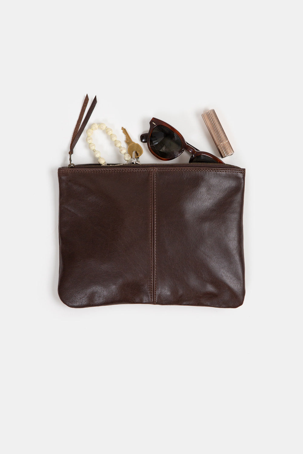 Elke Leather Zip Clutch In Nocino