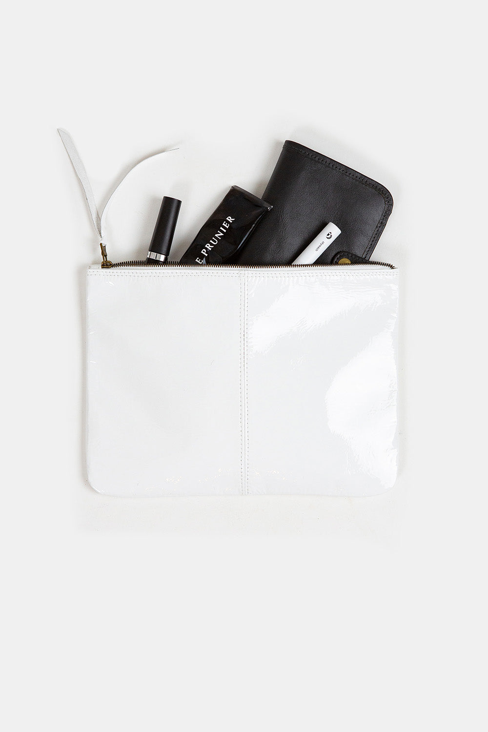 Elke Leather Zip Clutch In White Patent