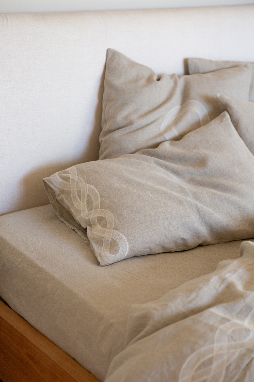 Serpens Embroidered Pillowcases in Natural Linen