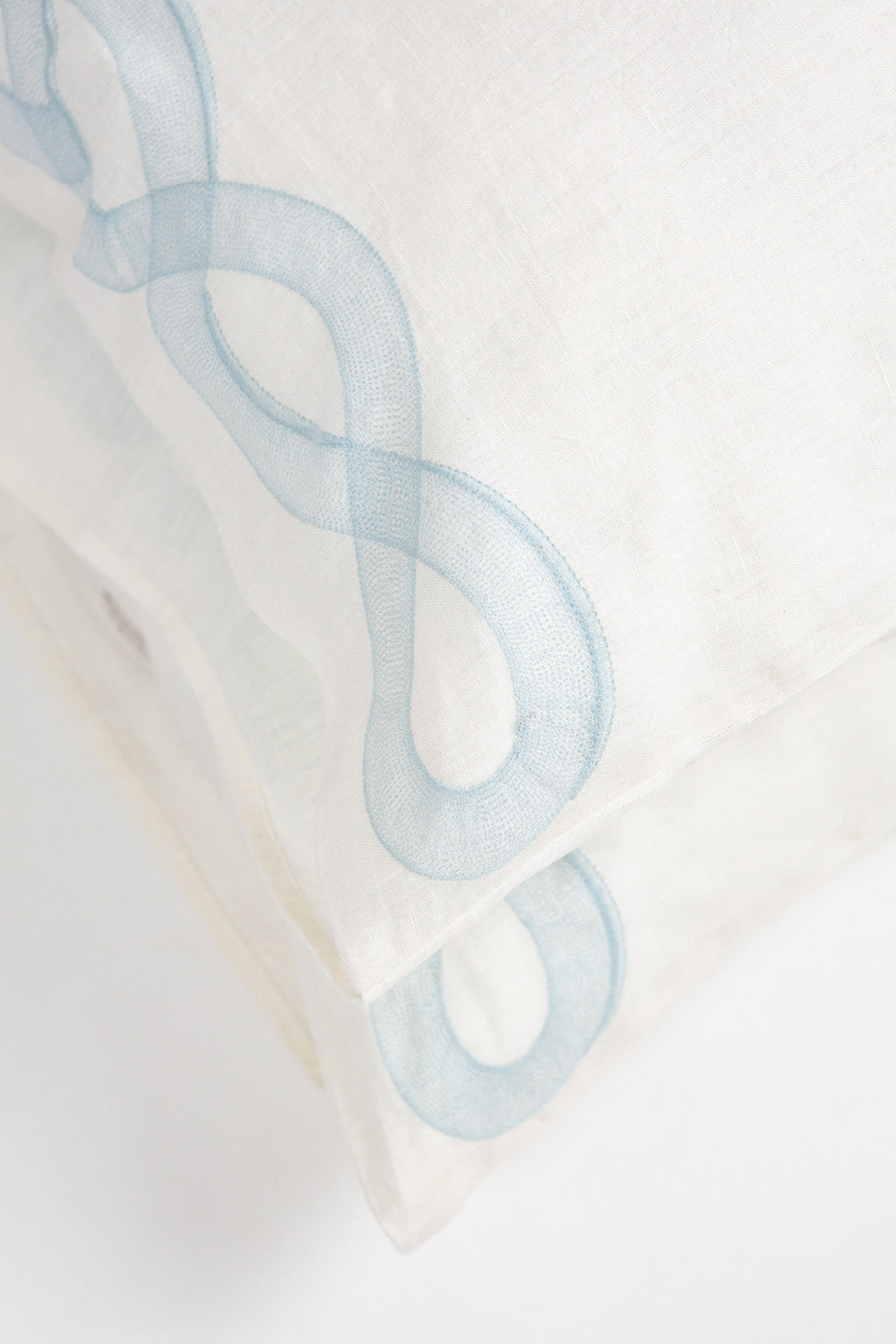Serpens Embroidered Pillowcases in Soft White Linen