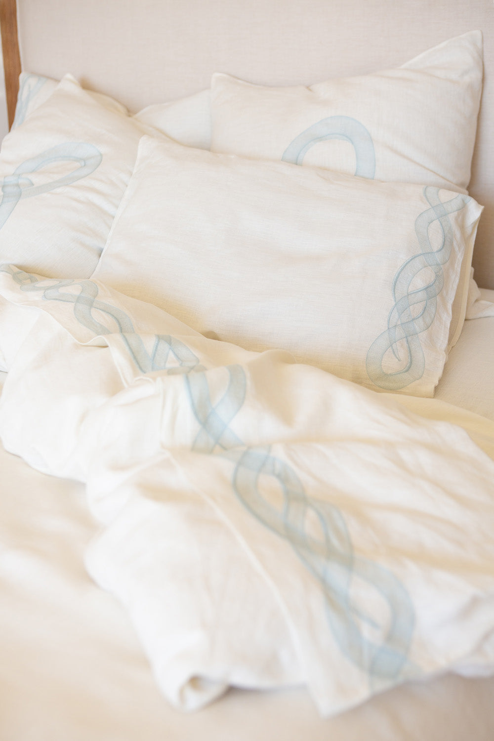 Serpens Embroidered Pillowcases in Soft White Linen