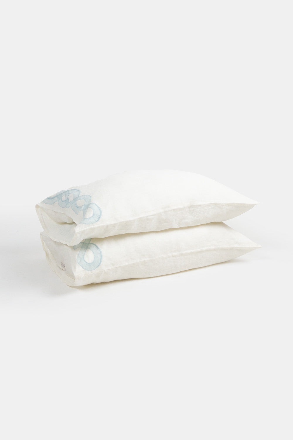Serpens Embroidered Pillowcases in Soft White Linen