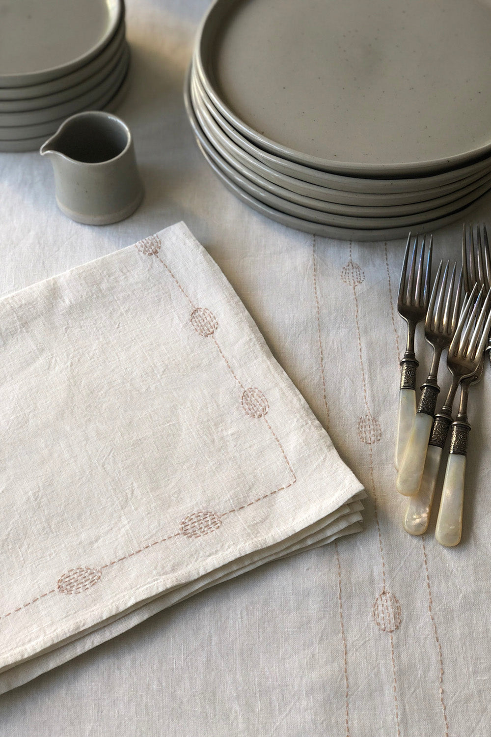 Totem Napkin in Hand-embroidered Soft White Linen
