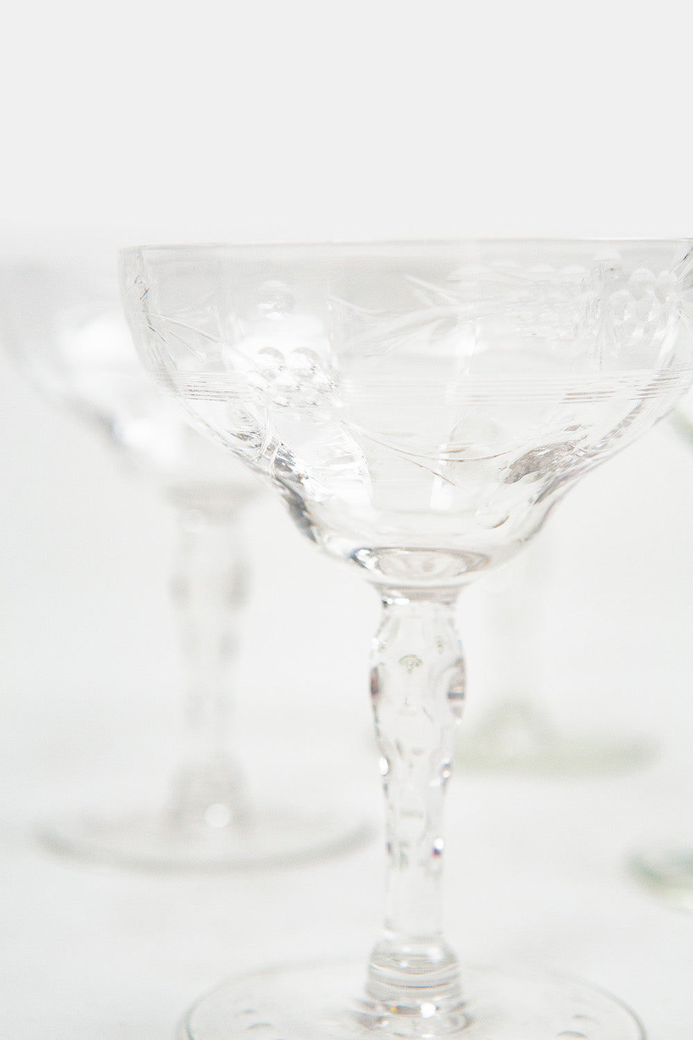 Clear glass goblet on a white background