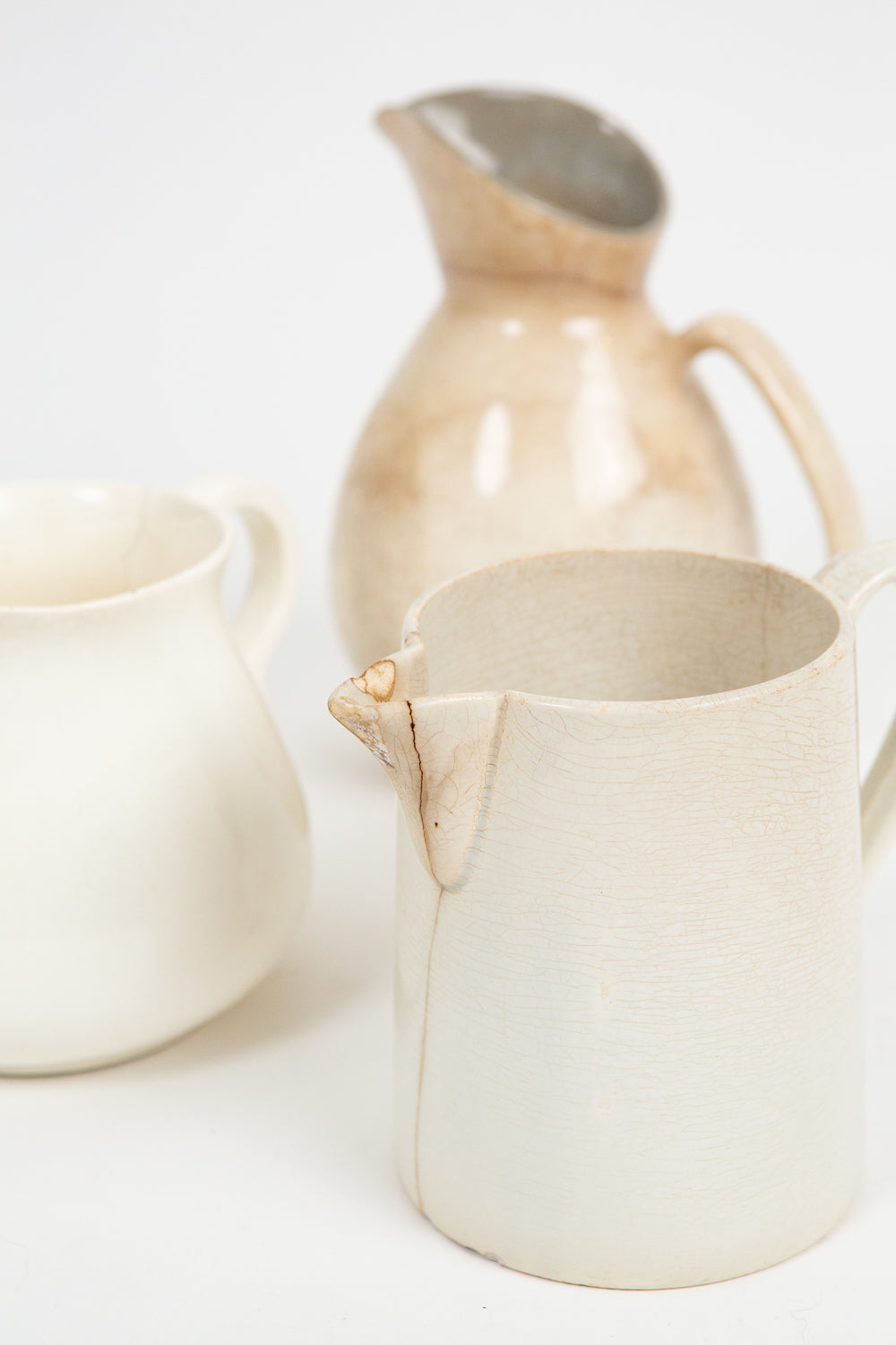 Trio of Assorted Ivory pitchers