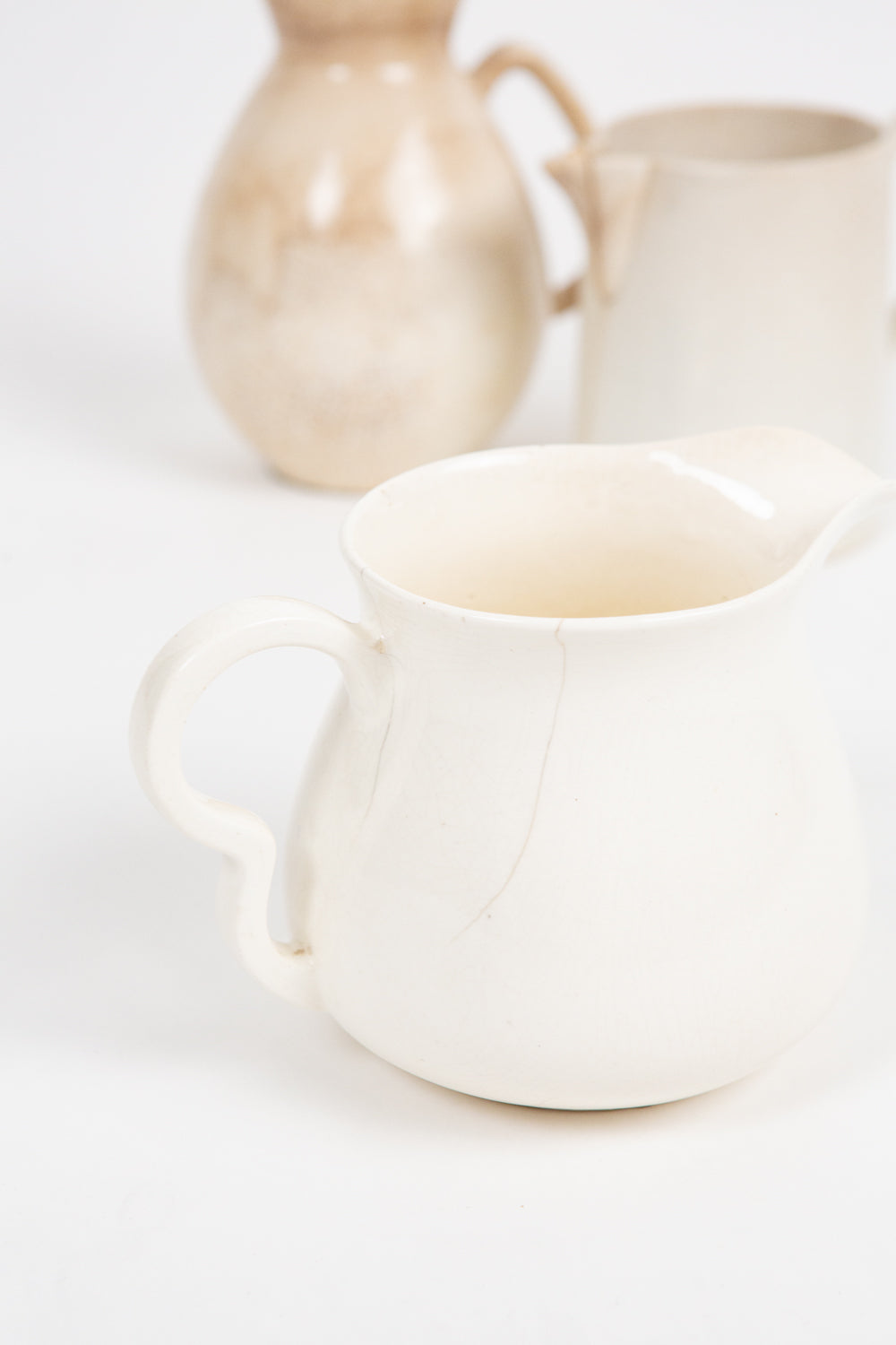 Trio of Assorted Ivory pitchers