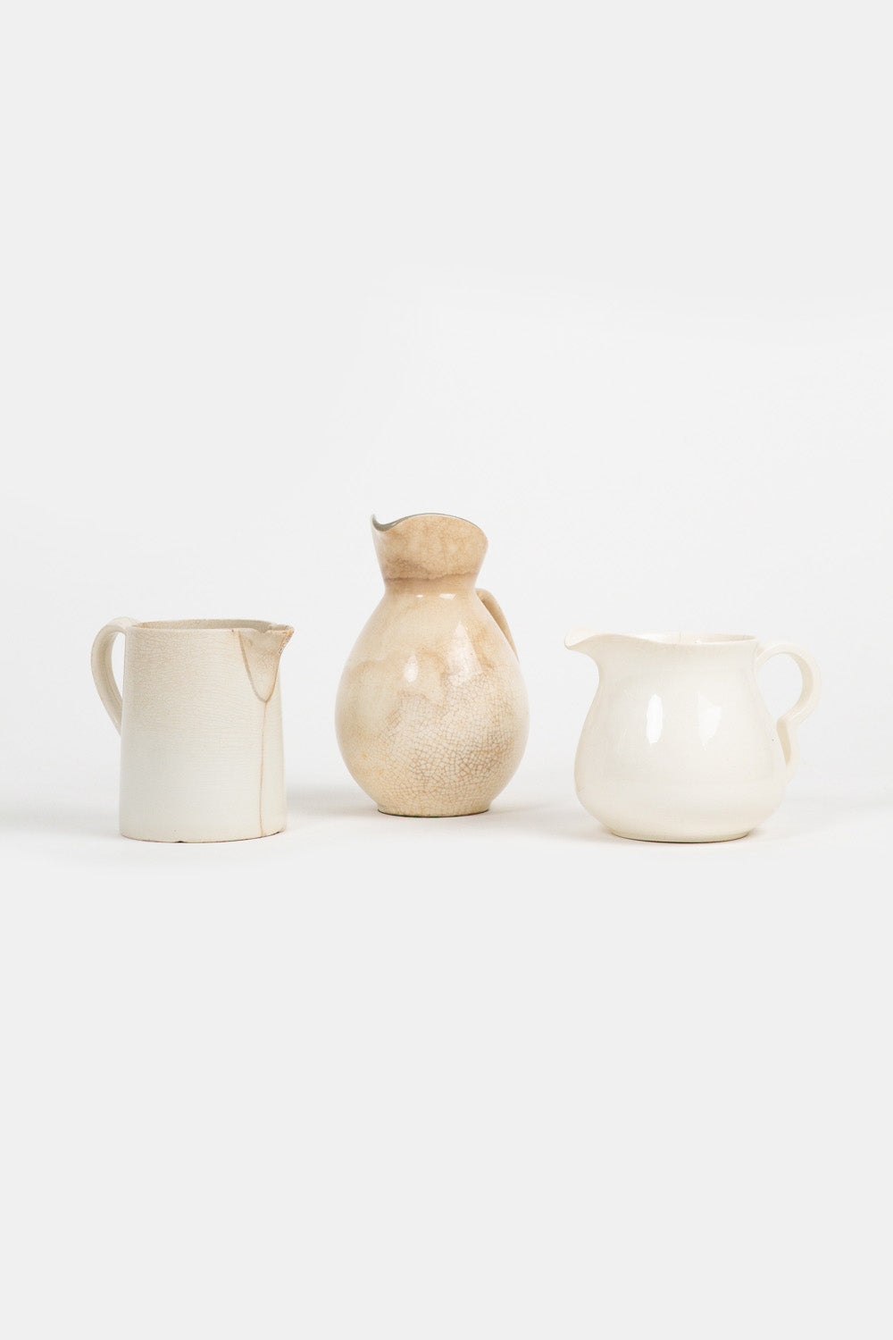 Trio of Assorted Ivory pitchers