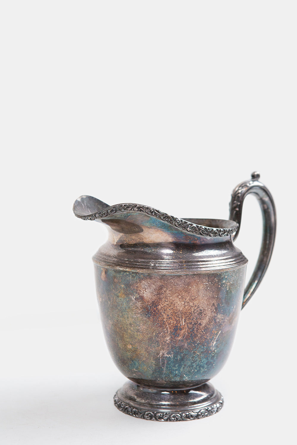 Ornate Silver Pitcher