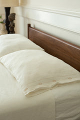 Totem Pillowcases in Hand-embroidered Soft White Linen